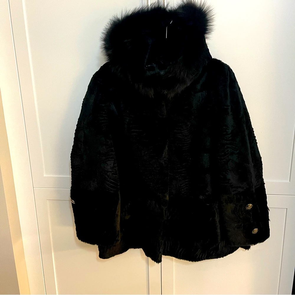 Women’s black Persian lamb hooded fur coat